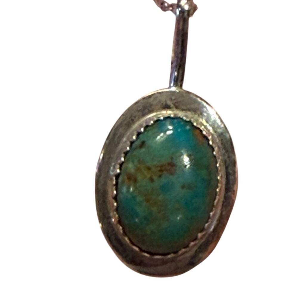 Sterling and Native Turquoise Oval Pendant has SV and Sterling on back 18”